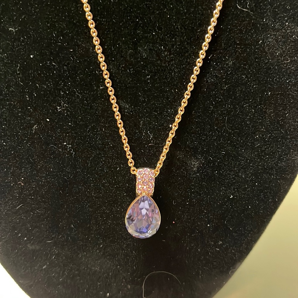 N16. Purple stone necklace with purple rhinestone accents.